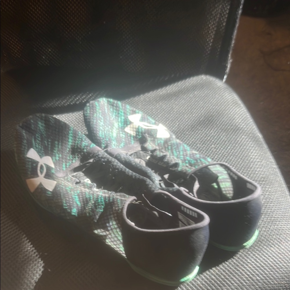 Under armor, miller pro, track shoes
With spikes